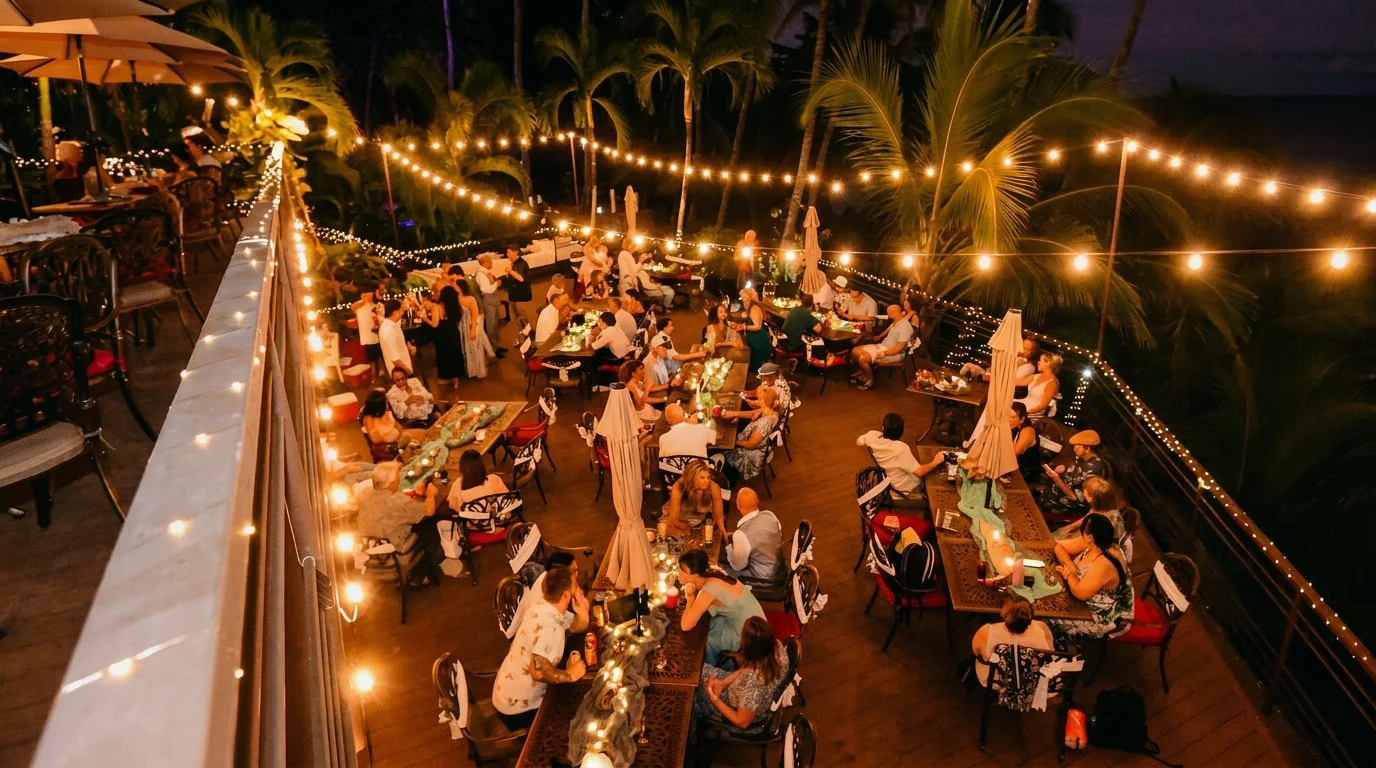 Evening celebration on the estate deck under string lights